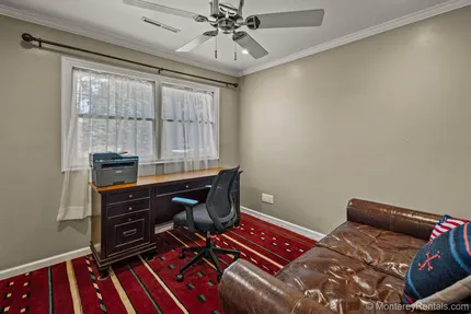 Office with oversized sofa